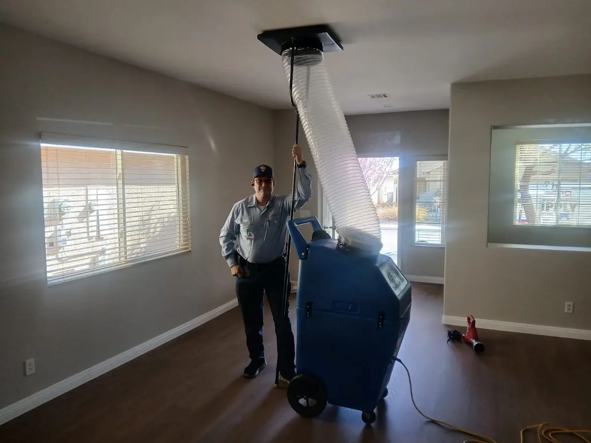Professional Dryer Vent Cleaning work inside a Parlier home